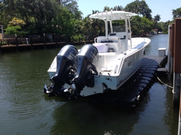 floating boat lift for a boat
