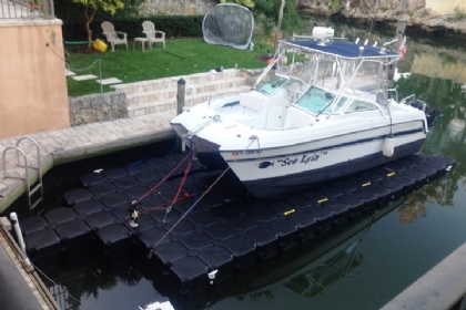 Catamaran boat lifts by JetDock