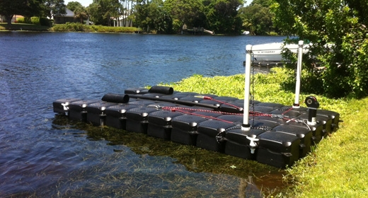 static floating boat lift with boat on it